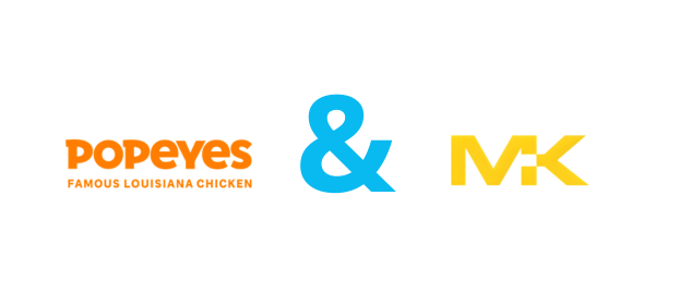 Cette image représente le logo de POPEYES FRANCE et de MONOLITH KLH. Cela illustre le gain de budget de POPEYES FRANCE par l'agence média MONOLITH KLH suite à une compétition d'agence organisée par PITCHVILLE.